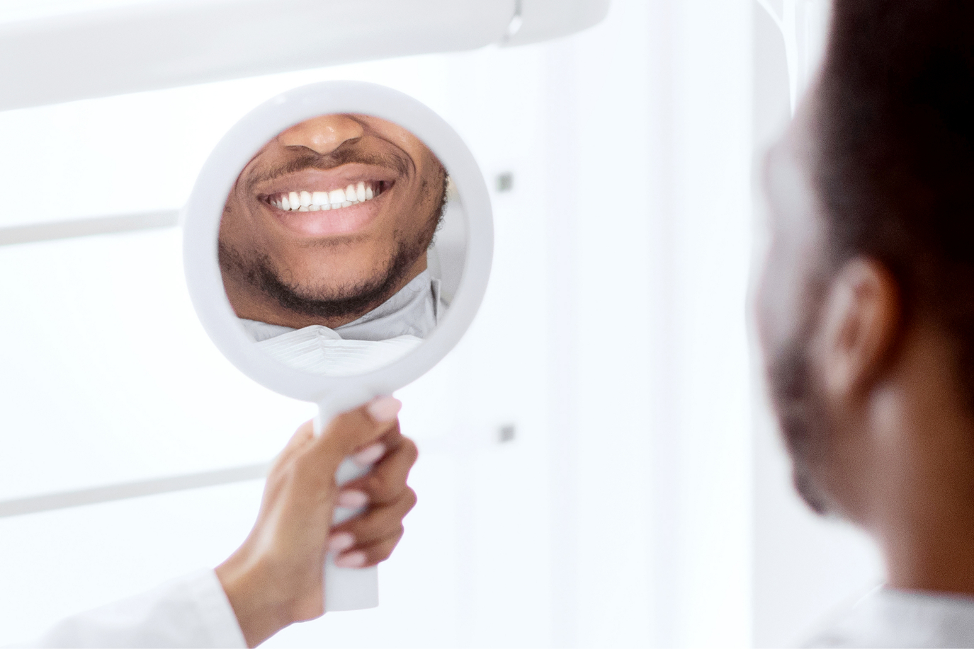 black-guy-looking-at-mirror-checking-his-teeth-af-2025-03-18-19-20-33-utc (1) (1)